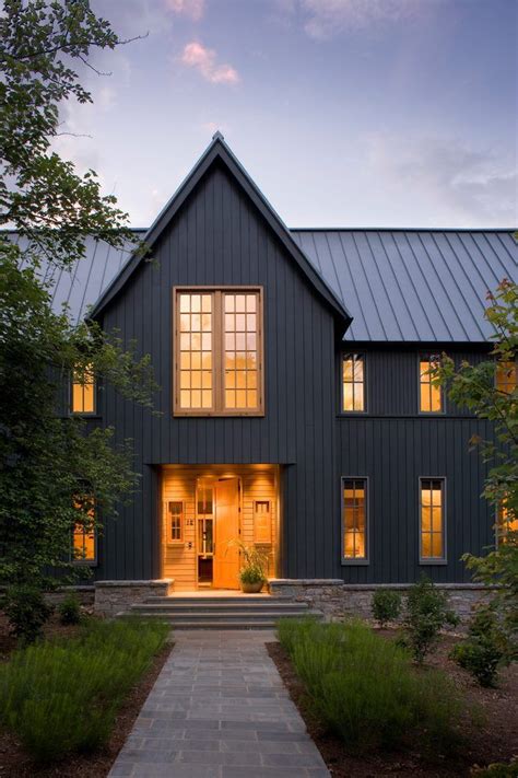 gray house black metal roof|gray exterior with black trim.